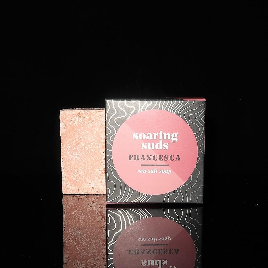 Francesca Sea Salt Spa Bar with rose clay and lavender essential oils, showcasing its natural ingredients and unique texture.