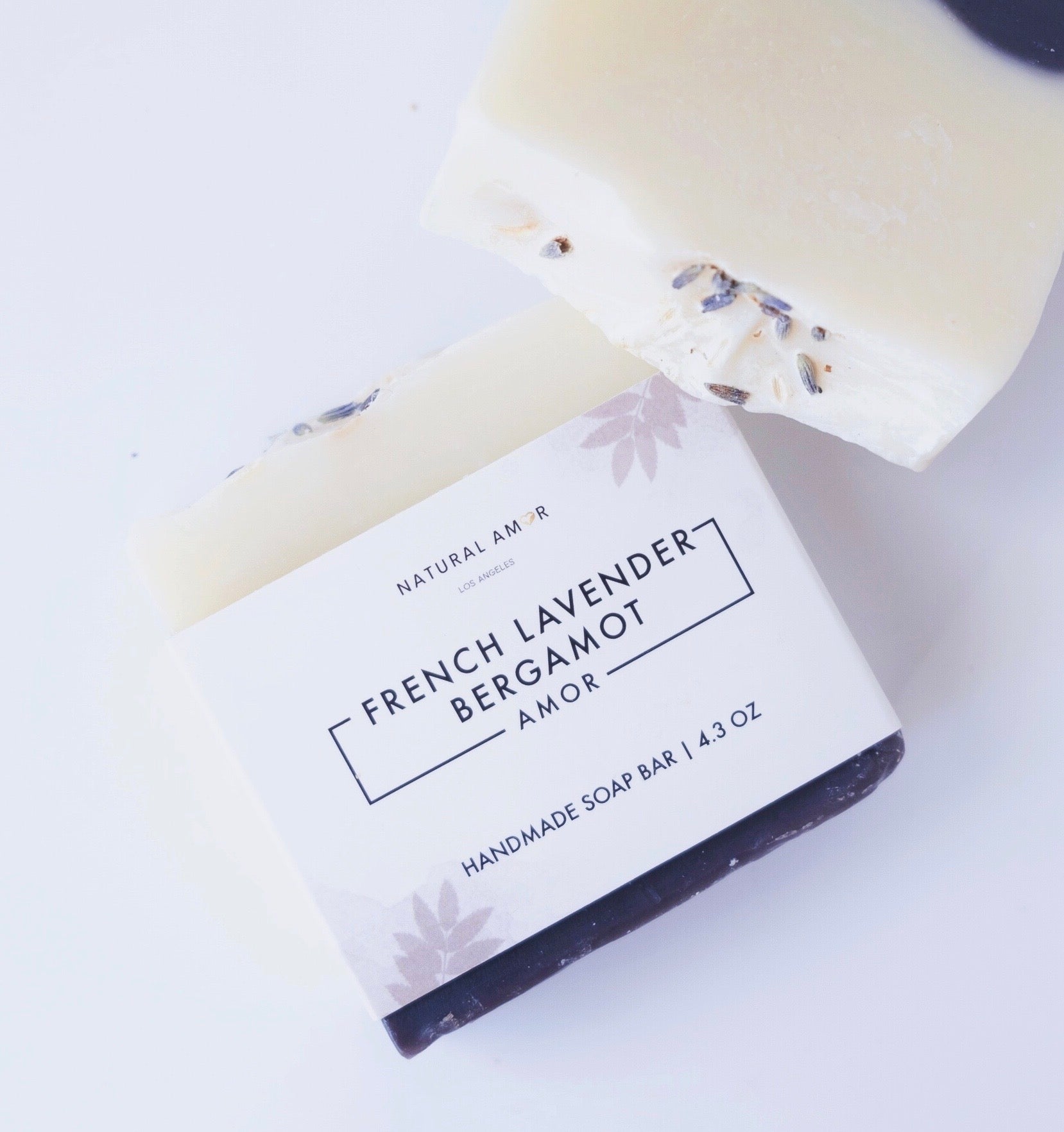 French Lavender Bergamot Soap Bar with natural ingredients, showcasing its rich texture and calming lavender color.