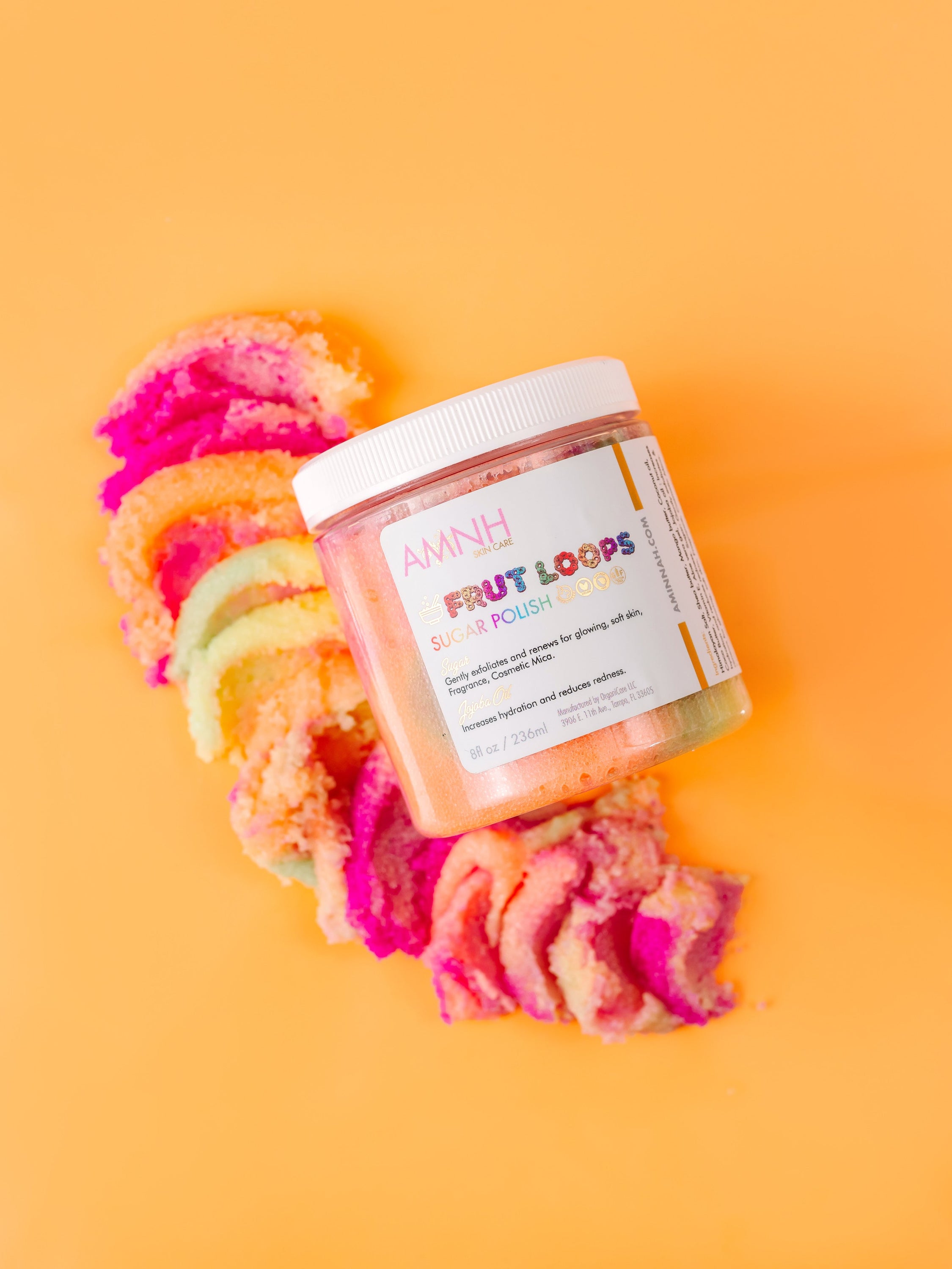 Fruit Loops Bundle featuring body butter, sugar scrub, body oil, cleansing foam, lip gloss, and bar soap with colorful packaging.