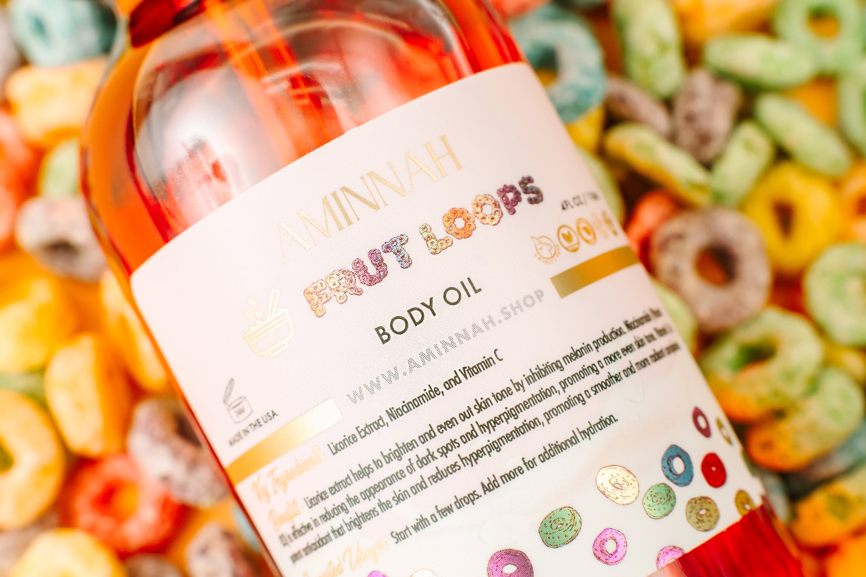 Fruit Loops Bundle featuring body butter, sugar scrub, body oil, cleansing foam, lip gloss, and bar soap with colorful packaging.