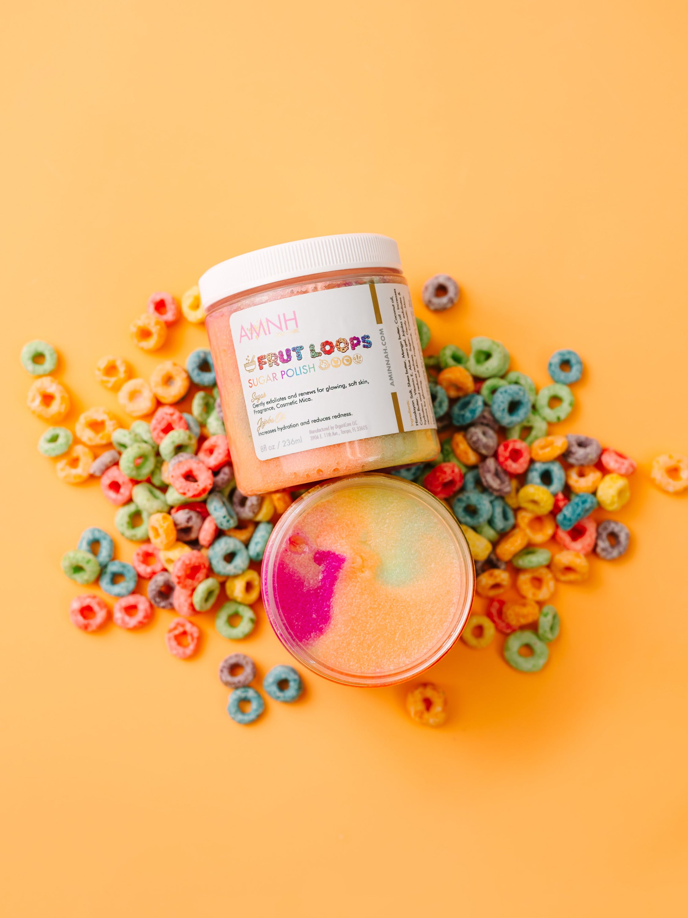 Fruit Loops Bundle featuring body butter, sugar scrub, body oil, cleansing foam, lip gloss, and bar soap with colorful packaging.