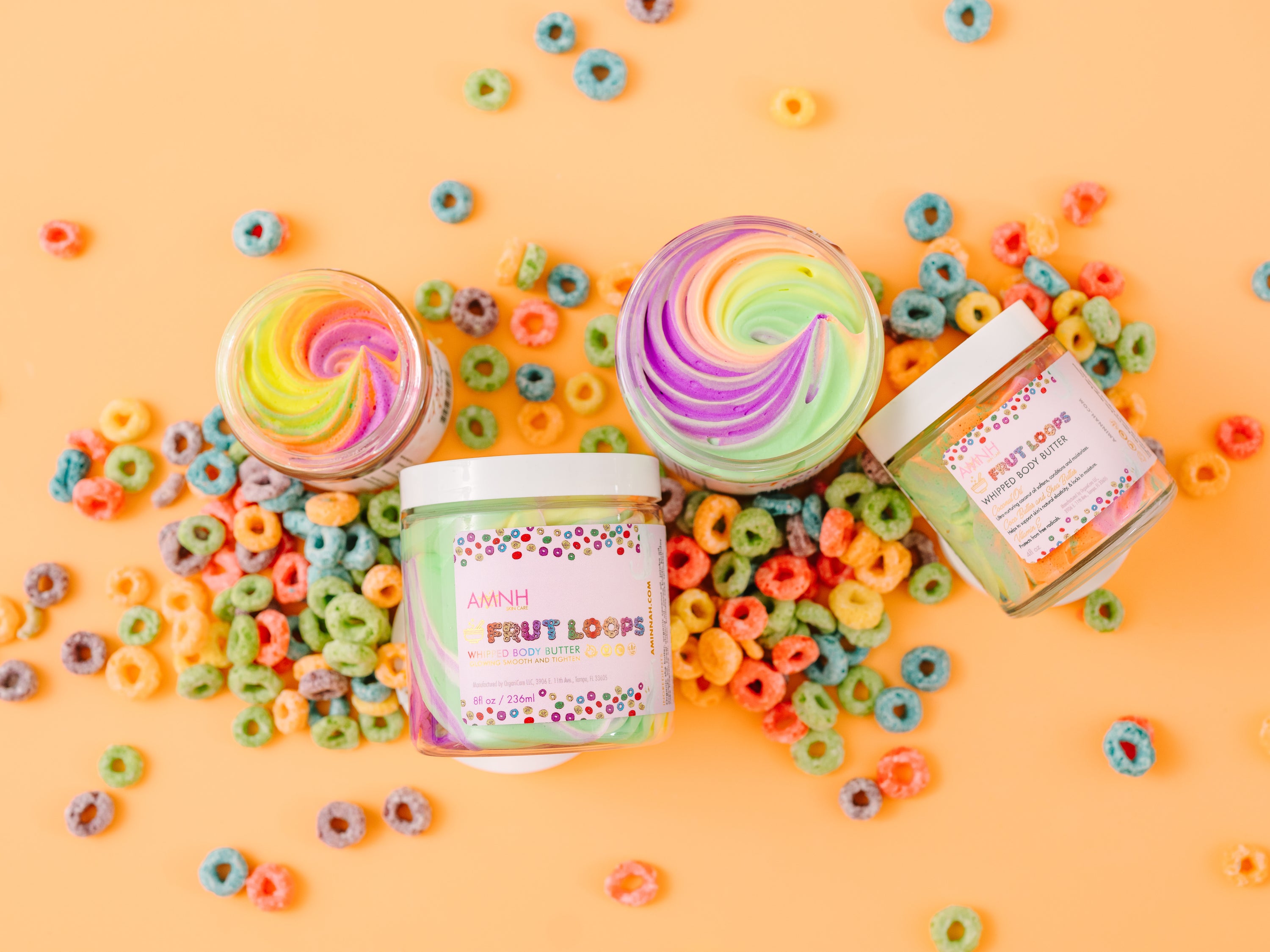 Frut Loops Whipped Body Butter in a jar, showcasing its creamy texture and vibrant colors reminiscent of Fruit Loops cereal.