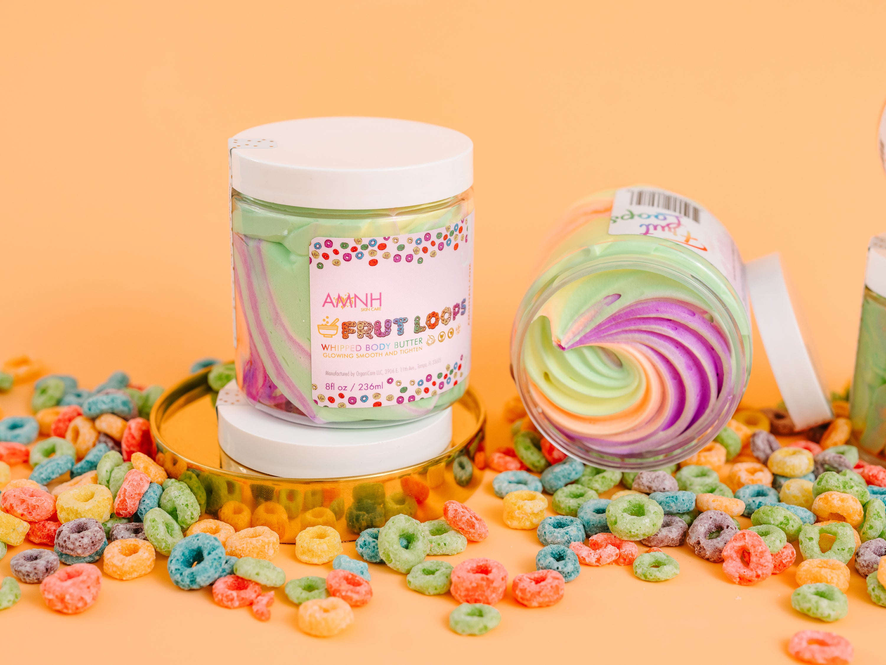 Frut Loops Whipped Body Butter in a jar, showcasing its creamy texture and vibrant colors reminiscent of Fruit Loops cereal.