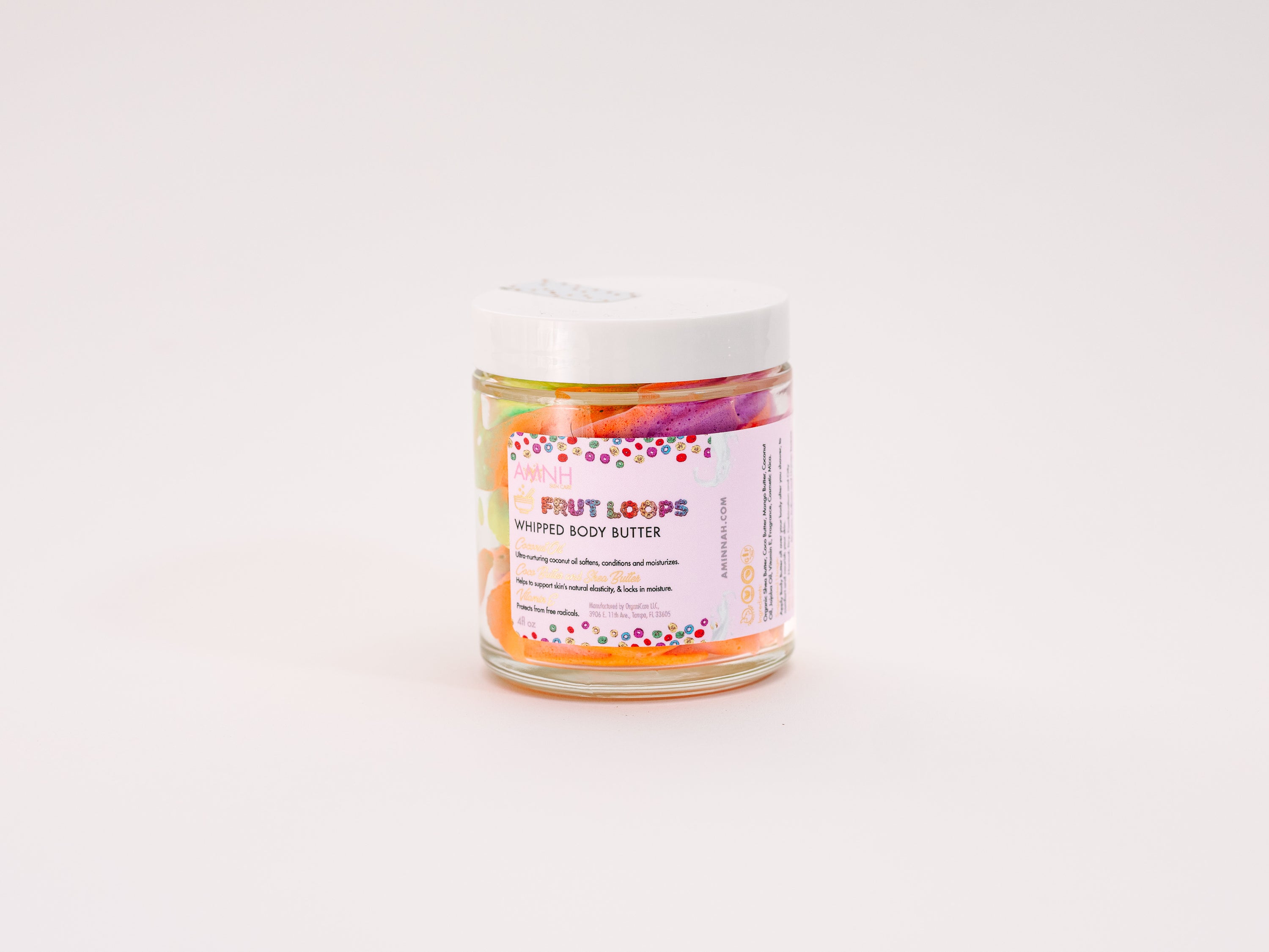 Frut Loops Whipped Body Butter in a jar, showcasing its creamy texture and vibrant colors reminiscent of Fruit Loops cereal.