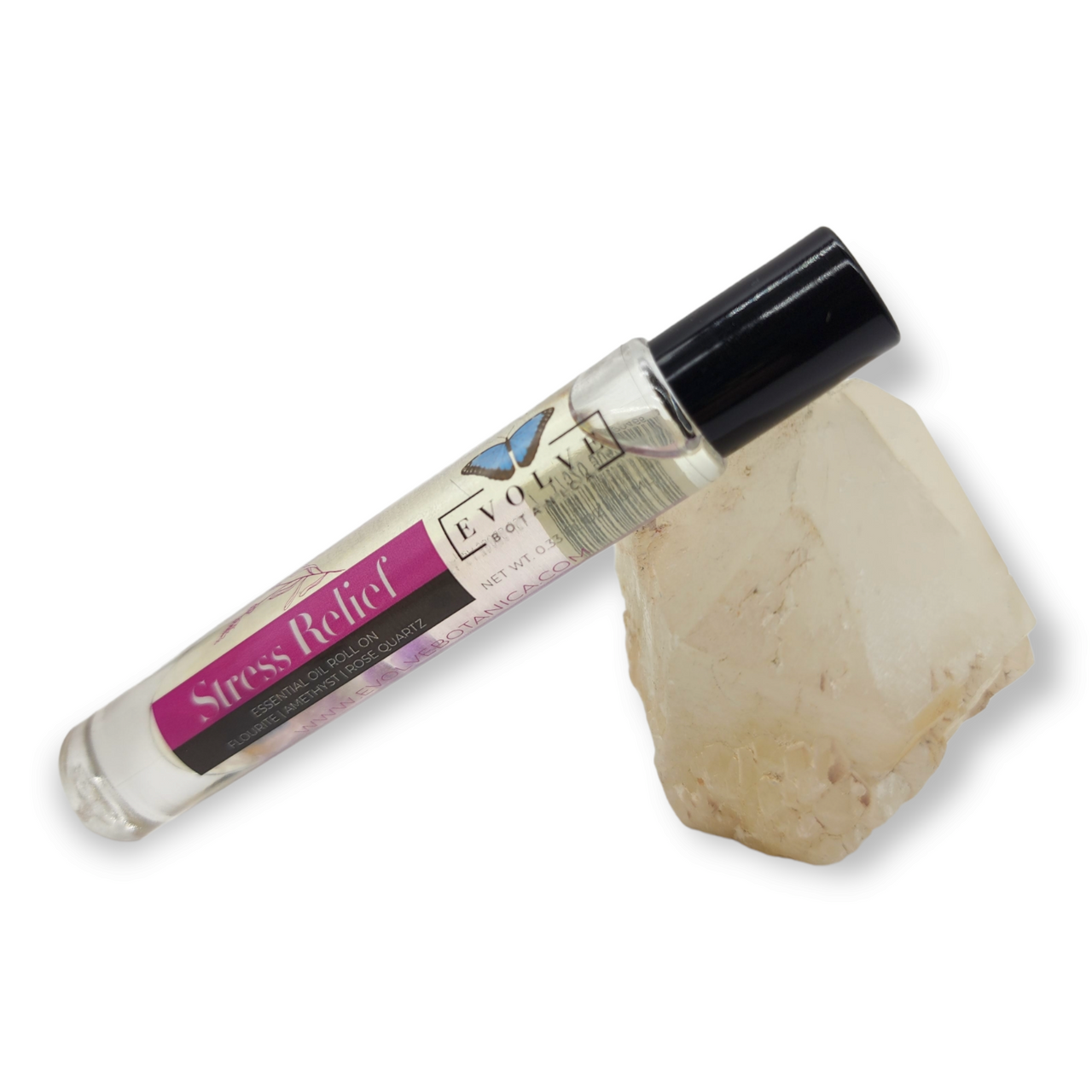 Gemstone Essential Oil Roll On in a glass bottle with a stainless steel roller ball, featuring a blend of essential oils and crystal infusion.