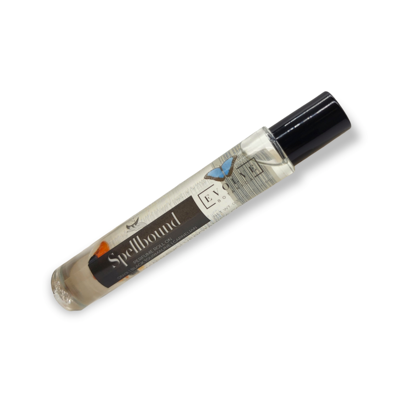 Spellbound Gemstone Perfume Roll On in a glass bottle with stainless steel roller ball, featuring a blend of amber, tobacco, and honey notes.