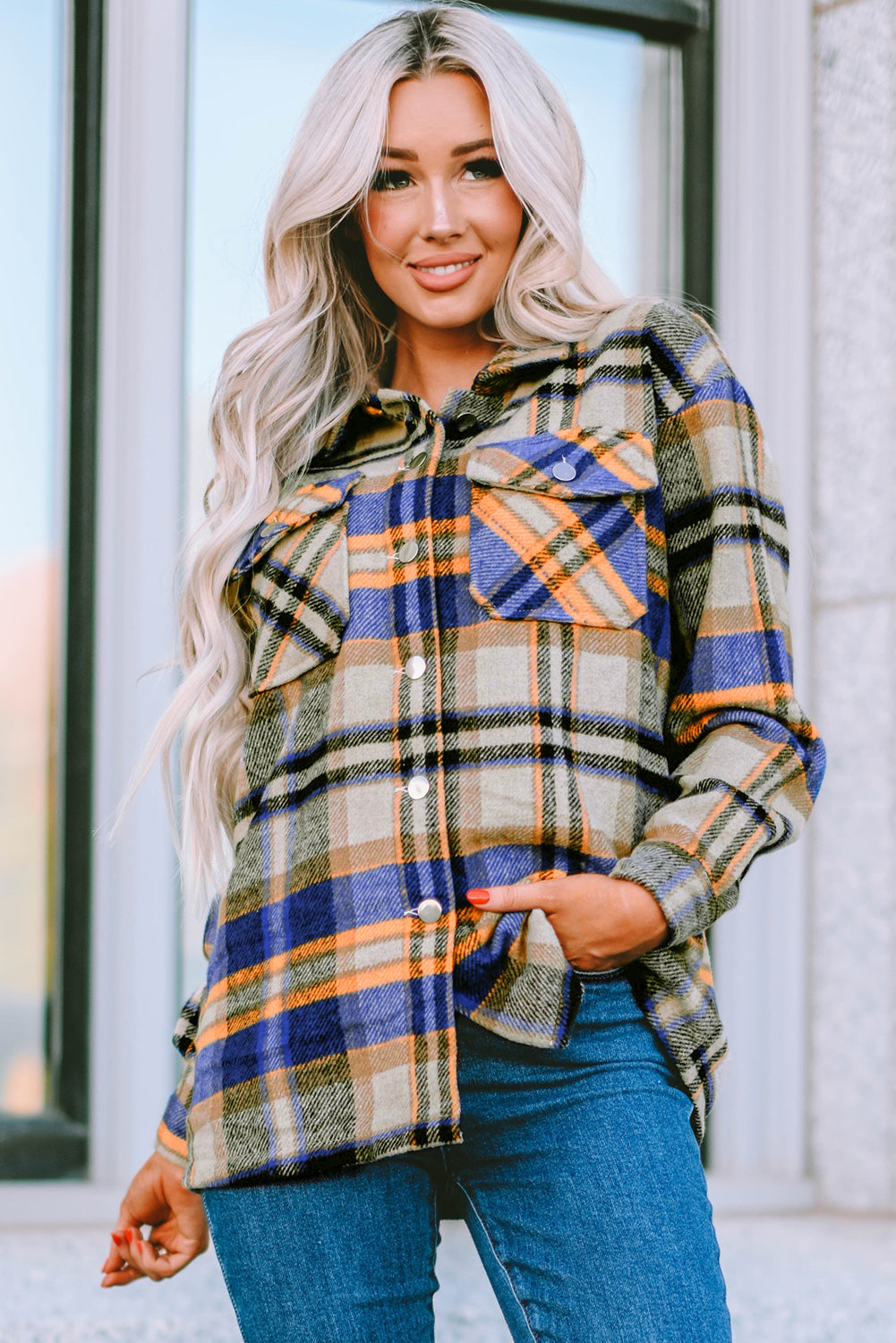 Geometric plaid print pocketed shacket featuring an oversized design, button front, and large front pockets, perfect for chilly weather.