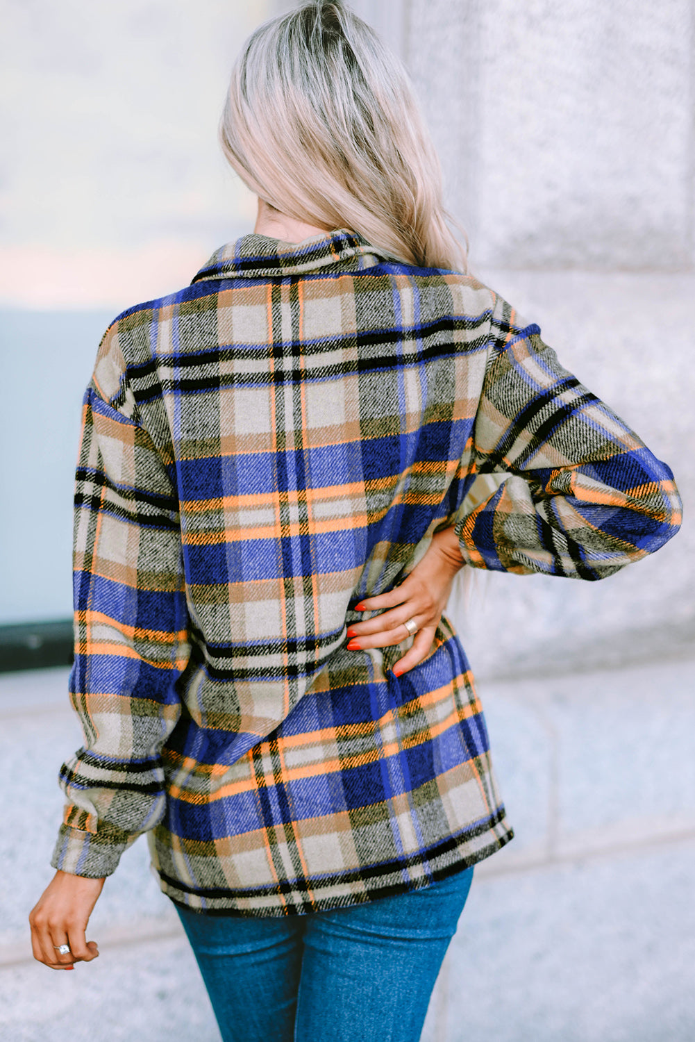 Geometric plaid print pocketed shacket featuring an oversized design, button front, and large front pockets, perfect for chilly weather.