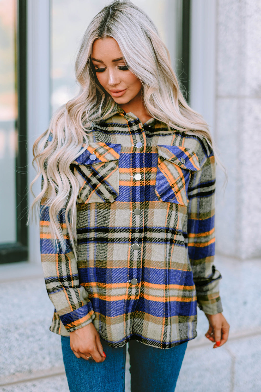 Geometric plaid print pocketed shacket featuring an oversized design, button front, and large front pockets, perfect for chilly weather.