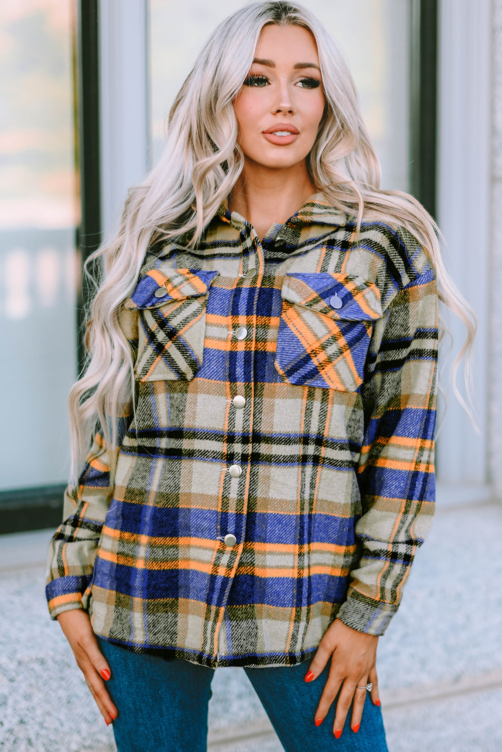 Geometric plaid print pocketed shacket featuring an oversized design, button front, and large front pockets, perfect for chilly weather.