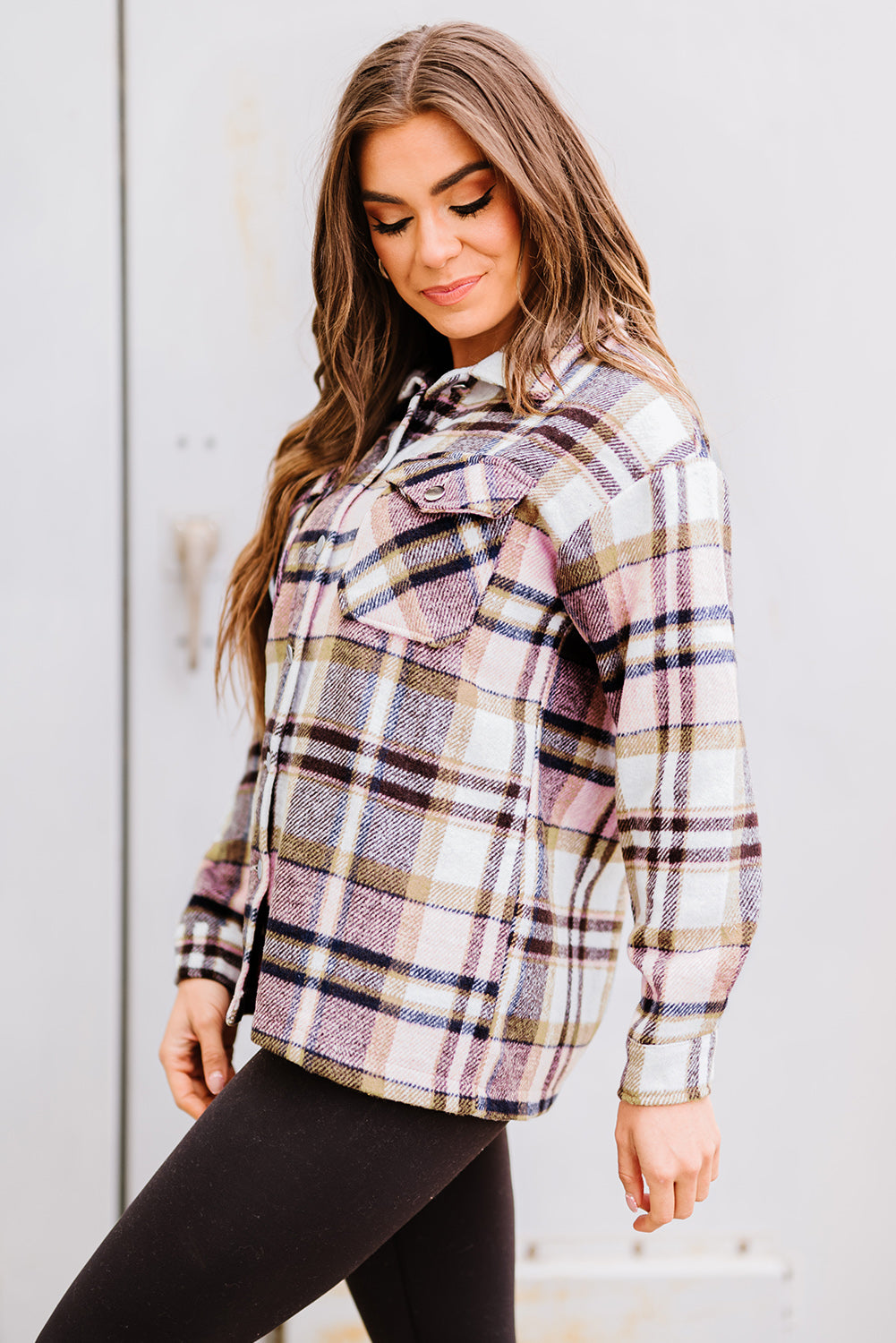 Geometric plaid print pocketed shacket featuring an oversized design, button front, and large front pockets, perfect for chilly weather.