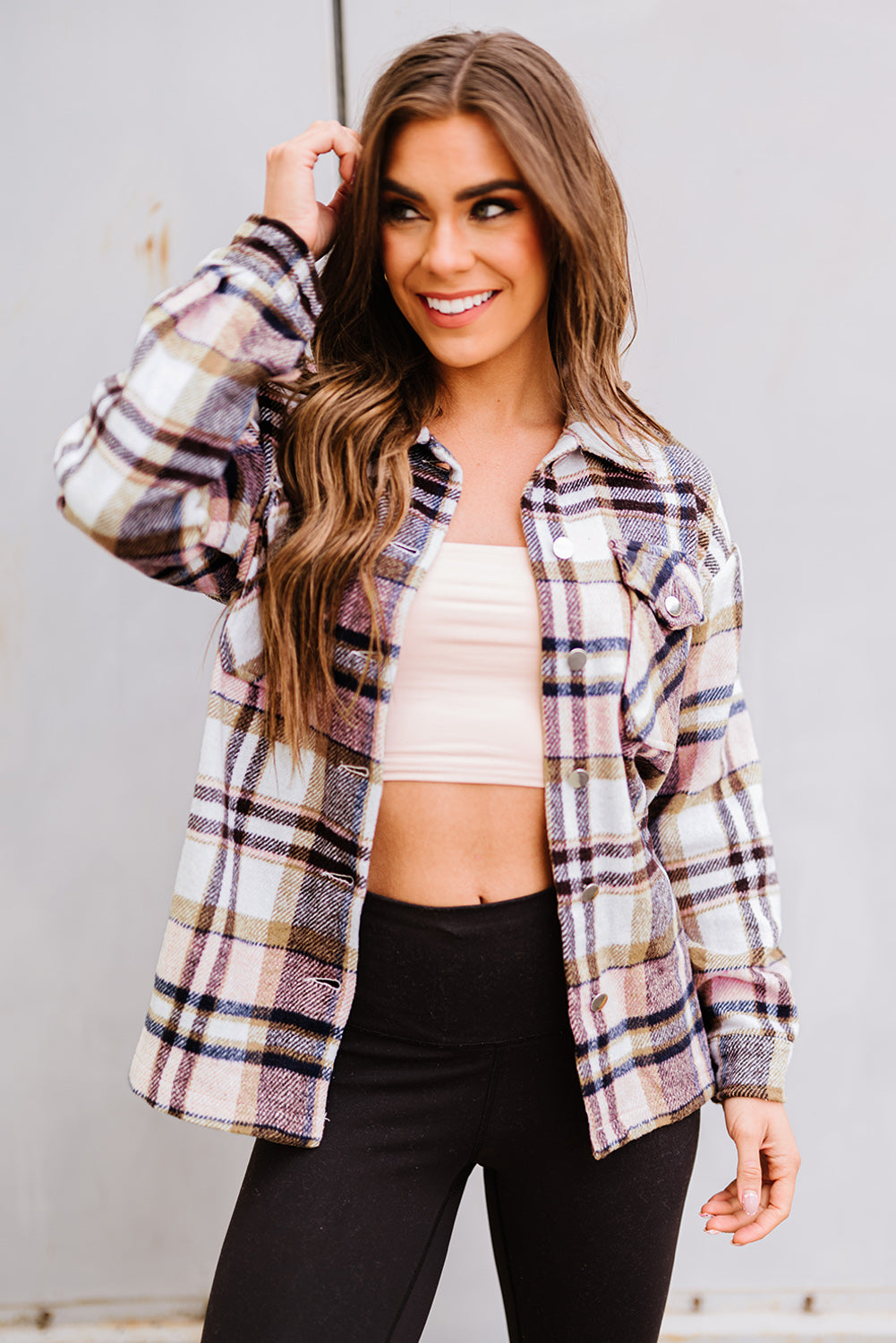 Geometric plaid print pocketed shacket featuring an oversized design, button front, and large front pockets, perfect for chilly weather.