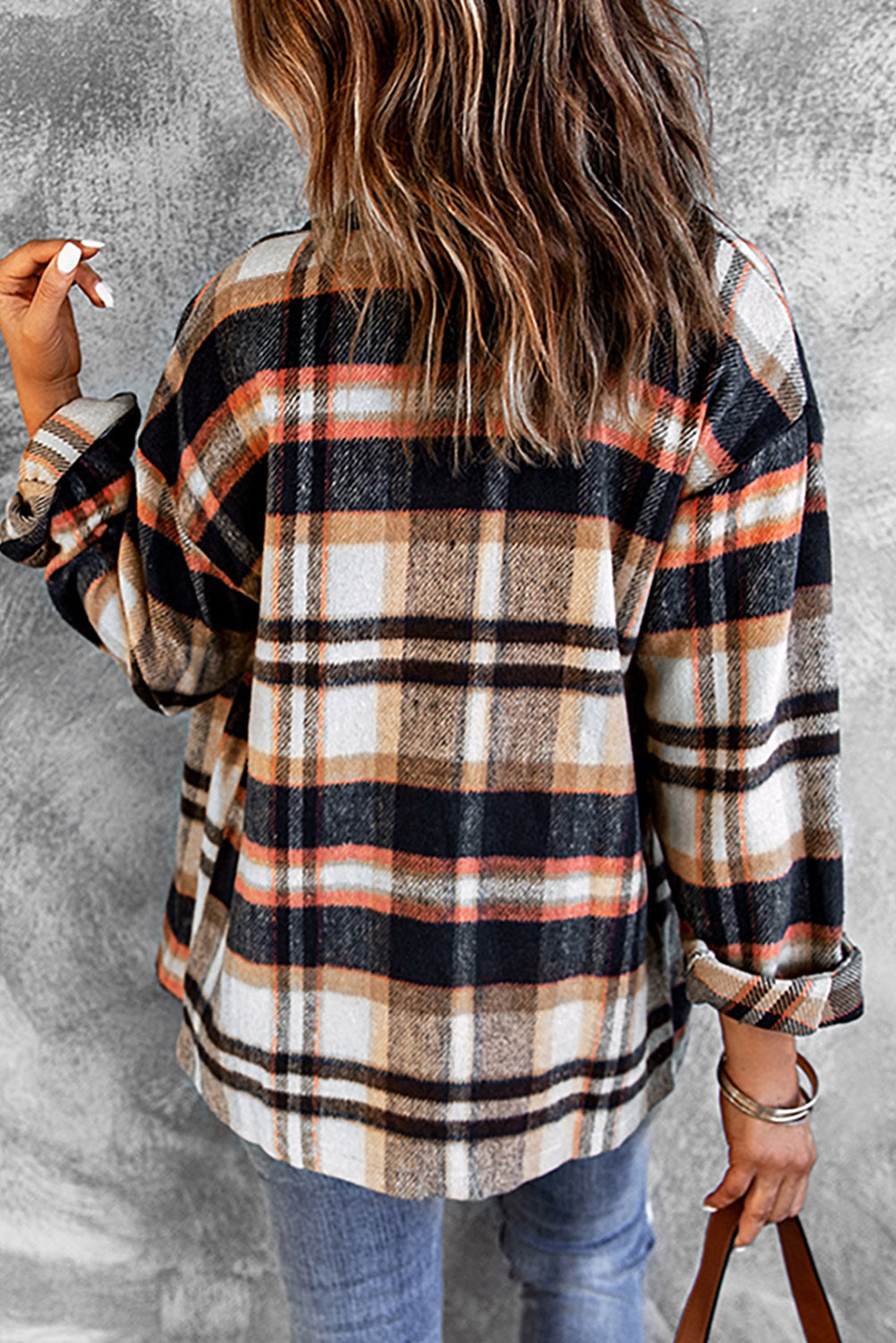 Geometric plaid print pocketed shacket featuring an oversized design, button front, and large front pockets, perfect for chilly weather.