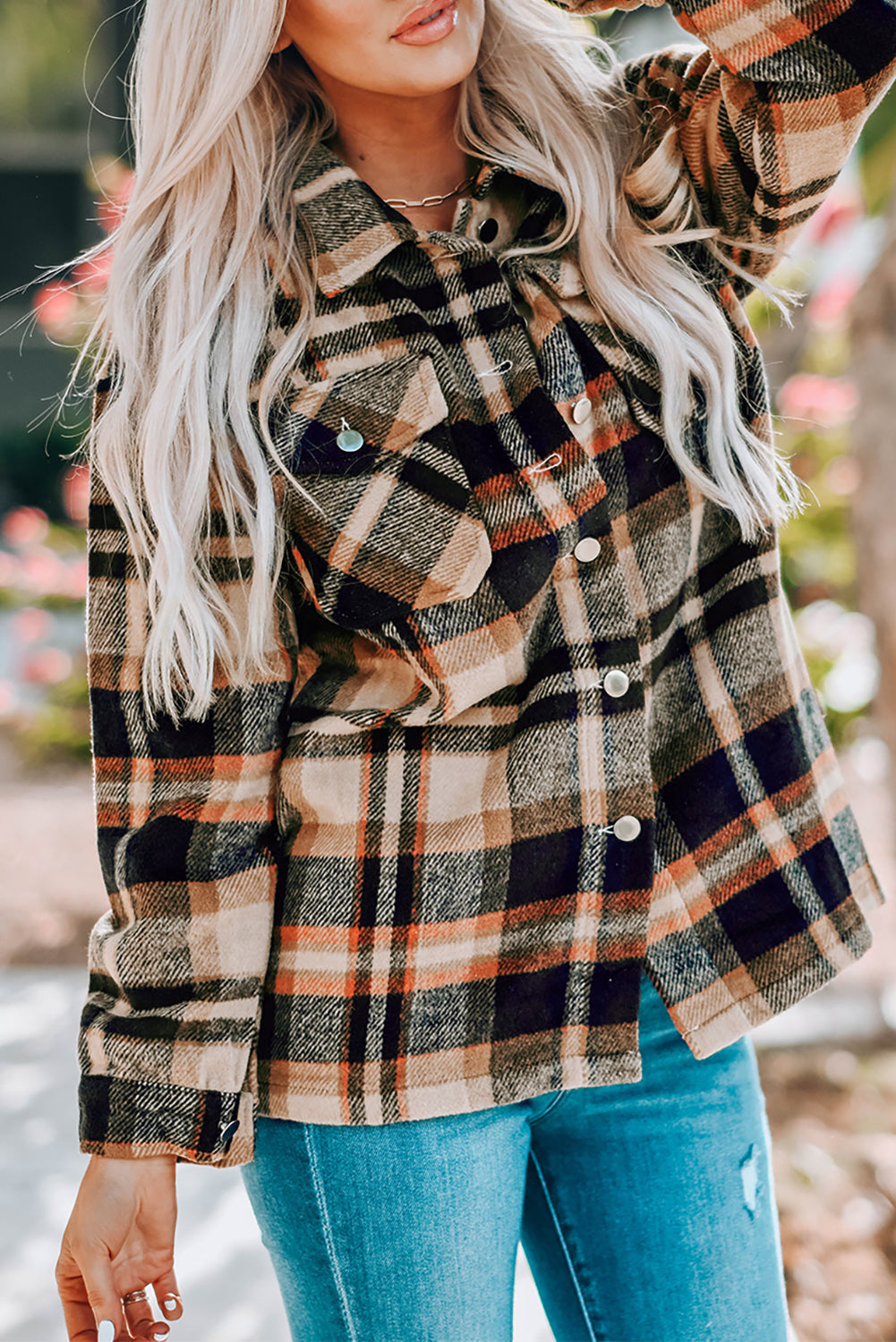 Geometric plaid print pocketed shacket featuring an oversized design, button front, and large front pockets, perfect for chilly weather.