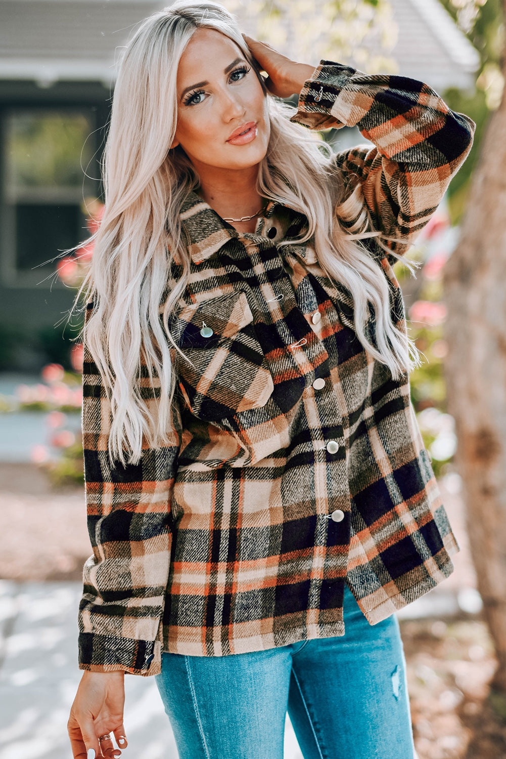 Geometric plaid print pocketed shacket featuring an oversized design, button front, and large front pockets, perfect for chilly weather.