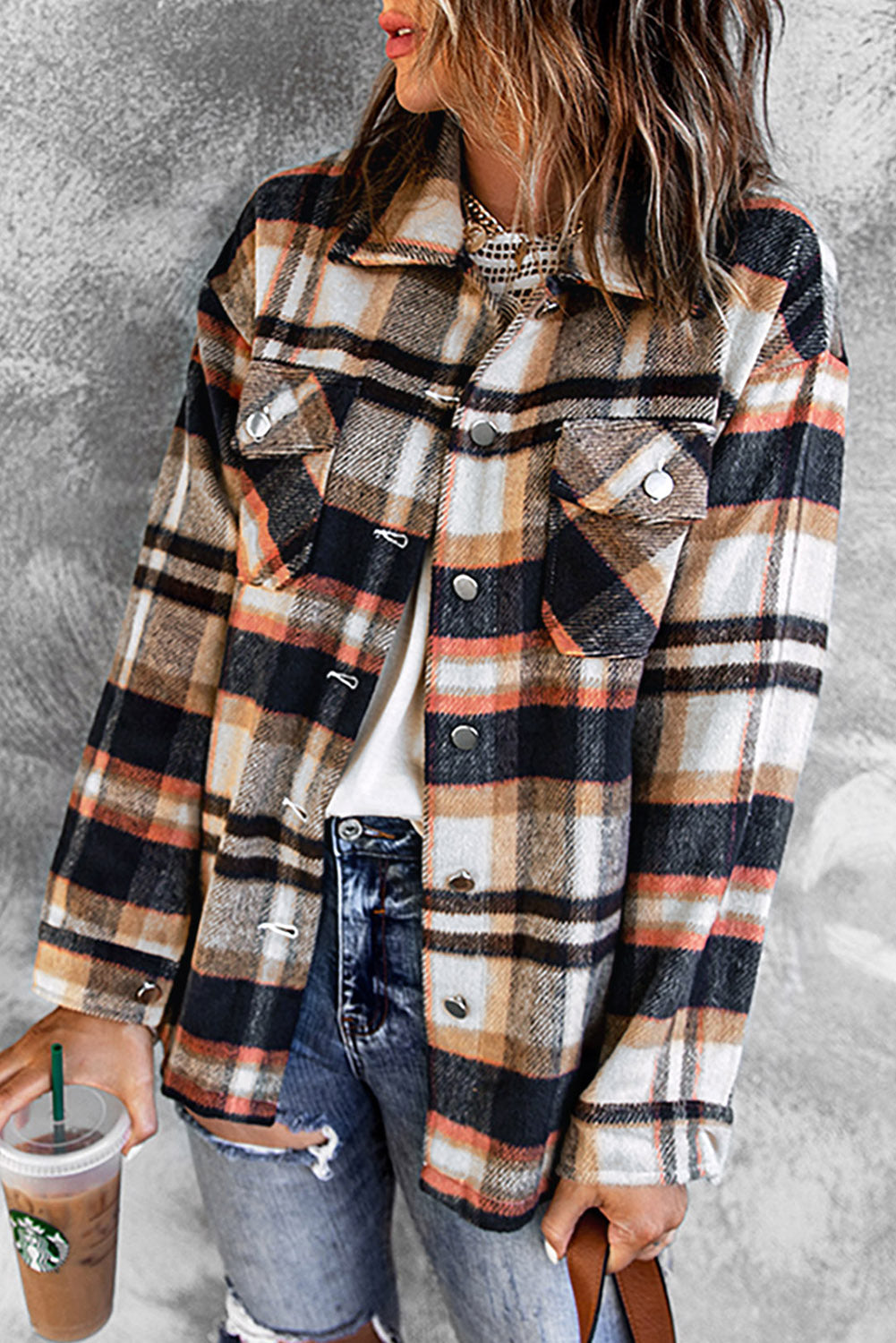 Geometric plaid print pocketed shacket featuring an oversized design, button front, and large front pockets, perfect for chilly weather.