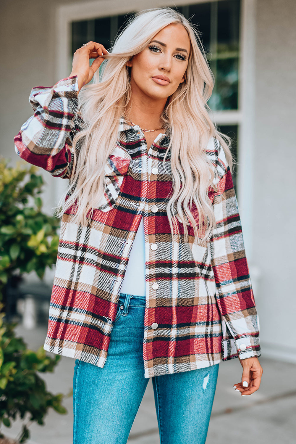 Geometric plaid print pocketed shacket featuring an oversized design, button front, and large front pockets, perfect for chilly weather.