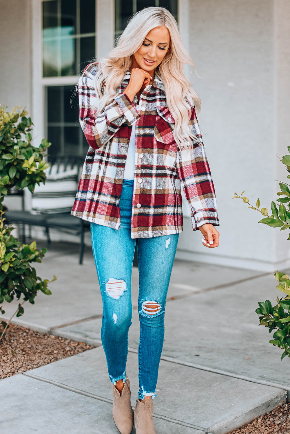 Geometric plaid print pocketed shacket featuring an oversized design, button front, and large front pockets, perfect for chilly weather.