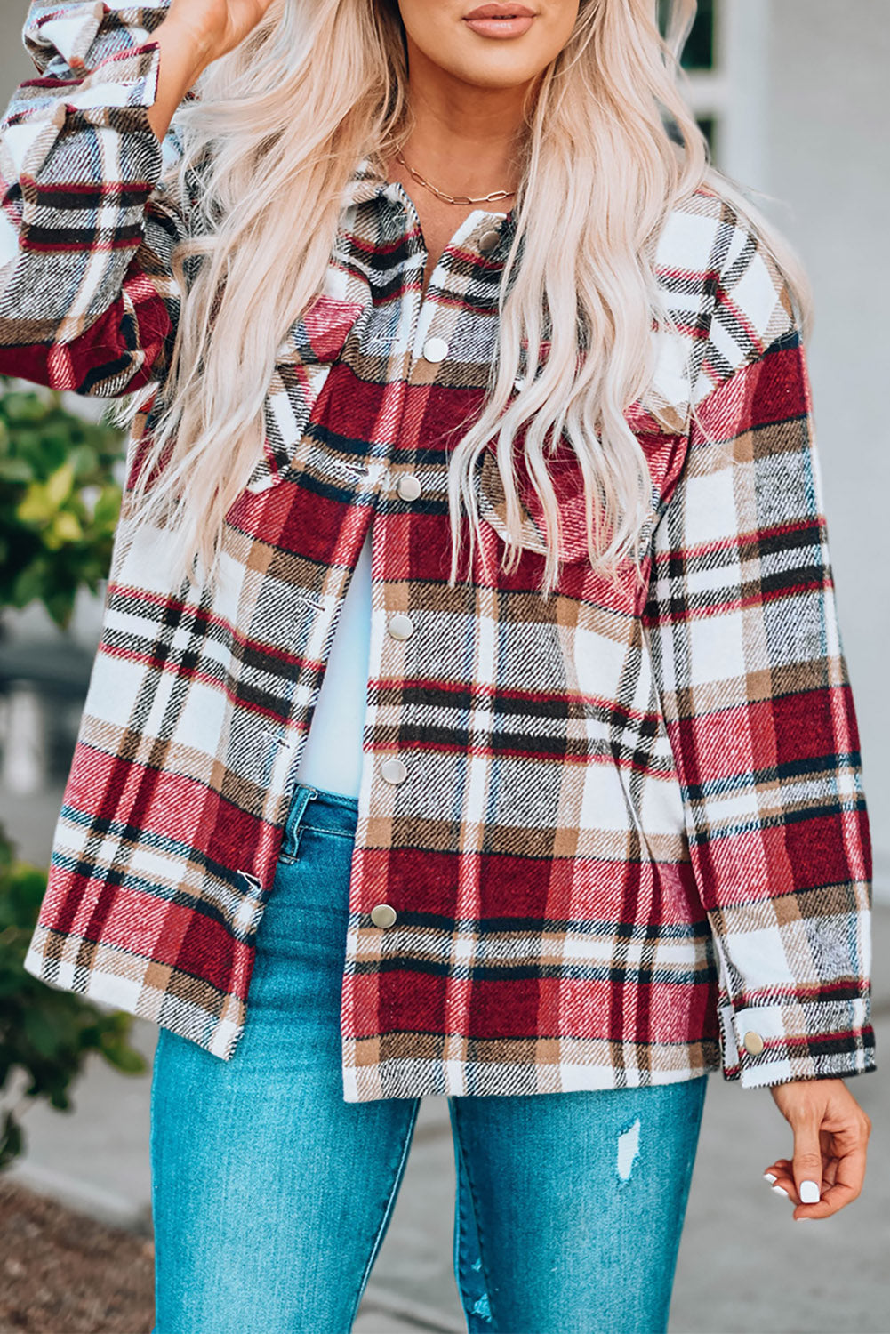 Geometric plaid print pocketed shacket featuring an oversized design, button front, and large front pockets, perfect for chilly weather.