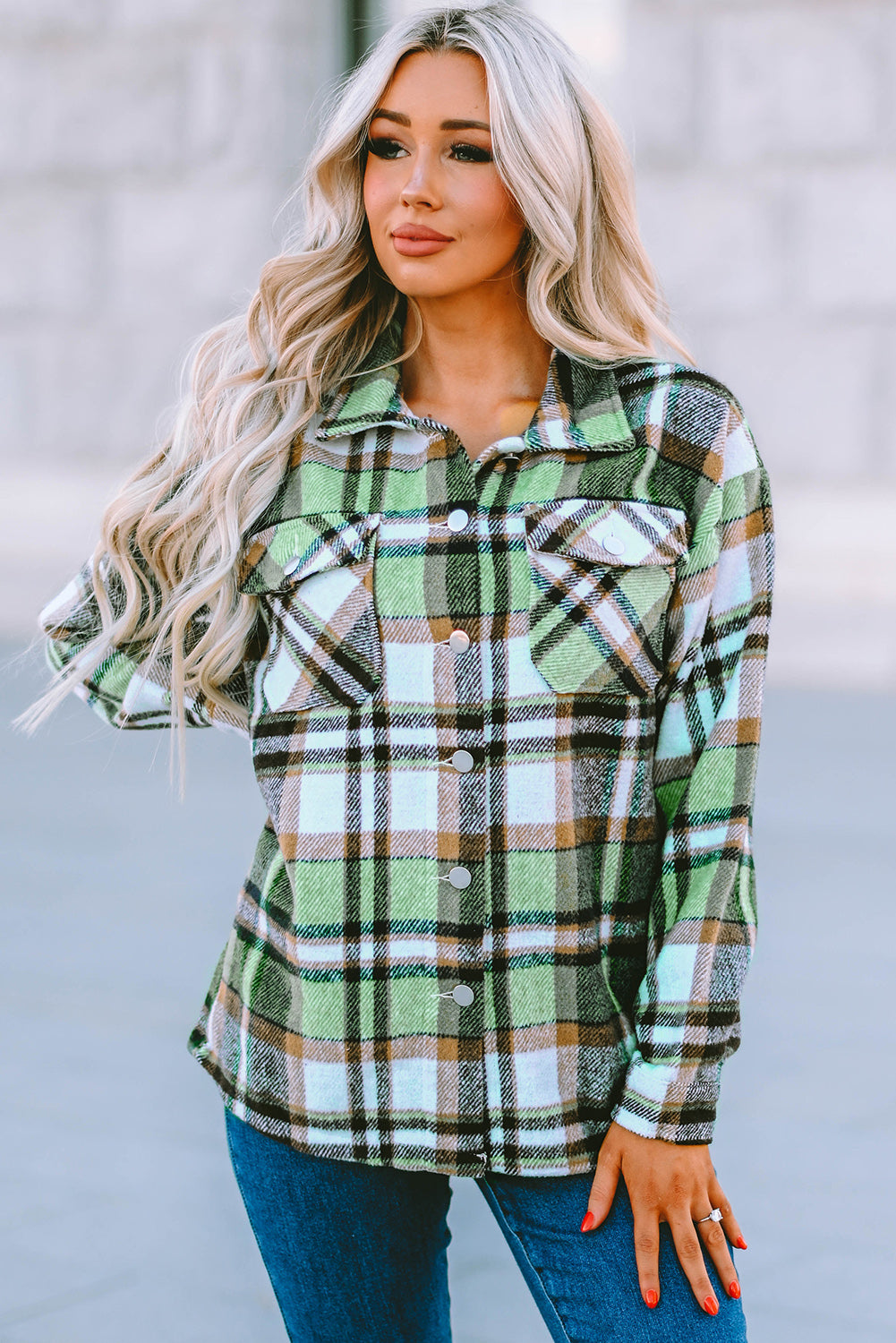 Geometric plaid print pocketed shacket featuring an oversized design, button front, and large front pockets, perfect for chilly weather.