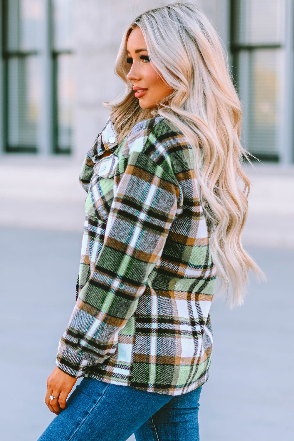 Geometric plaid print pocketed shacket featuring an oversized design, button front, and large front pockets, perfect for chilly weather.