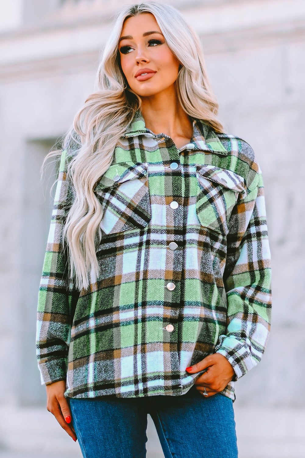 Geometric plaid print pocketed shacket featuring an oversized design, button front, and large front pockets, perfect for chilly weather.