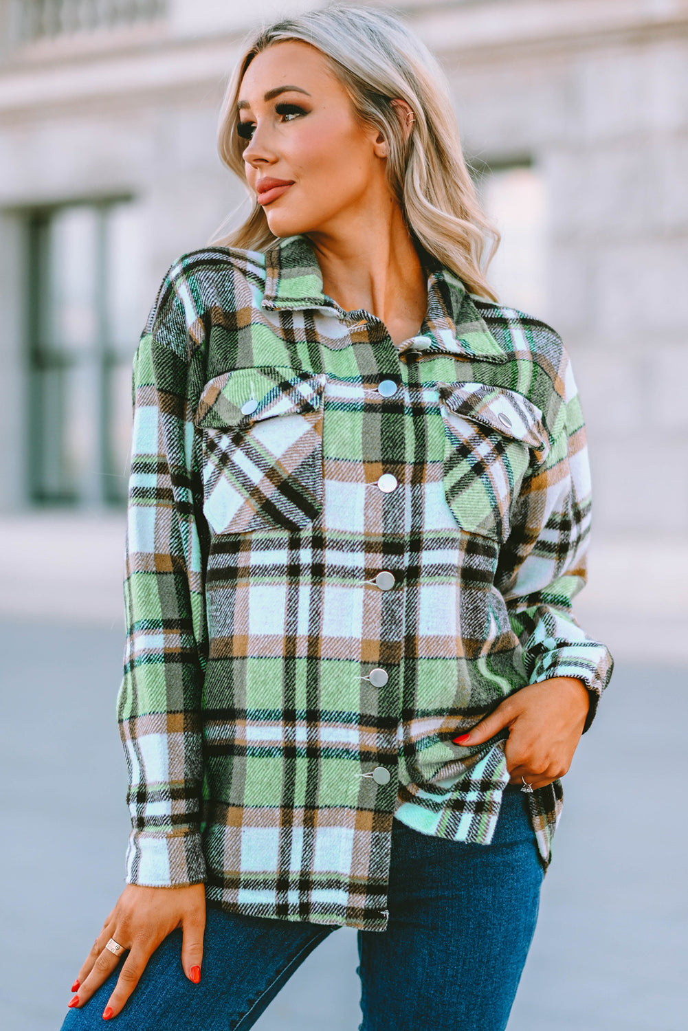 Geometric plaid print pocketed shacket featuring an oversized design, button front, and large front pockets, perfect for chilly weather.