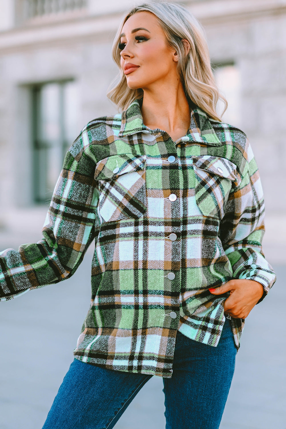 Geometric plaid print pocketed shacket featuring an oversized design, button front, and large front pockets, perfect for chilly weather.