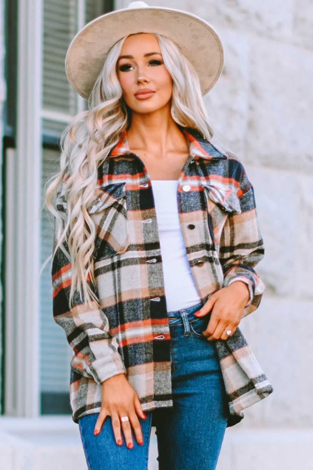 Geometric plaid print pocketed shacket featuring an oversized design, button front, and large front pockets, perfect for chilly weather.