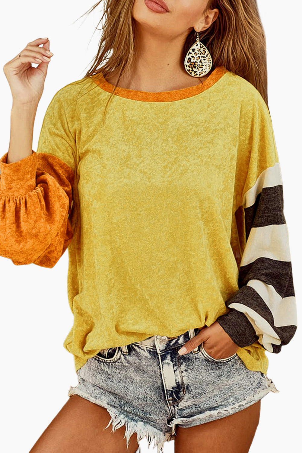 Ginger Colorblock Striped Sleeve Patchwork Drop Shoulder Top featuring a loose fit, colorblock design, and striped long sleeves.