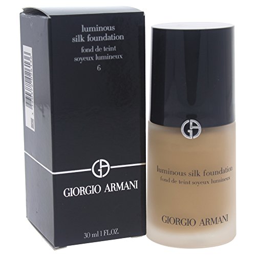 Giorgio Armani Luminous Silk Foundation - 06 in a sleek glass bottle with a pump dispenser, showcasing its elegant design.