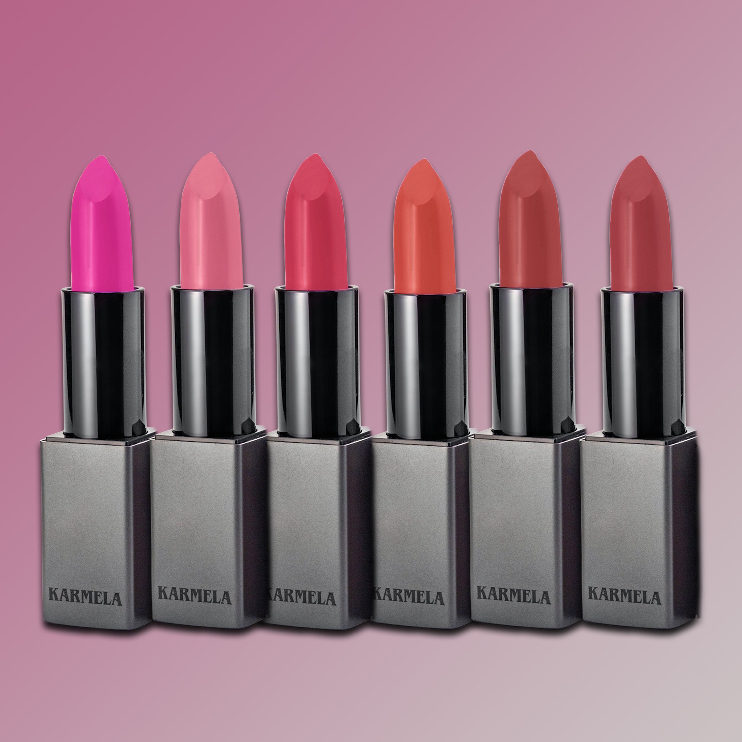 A vibrant collection of pink lipsticks in various shades, symbolizing support for breast cancer awareness.