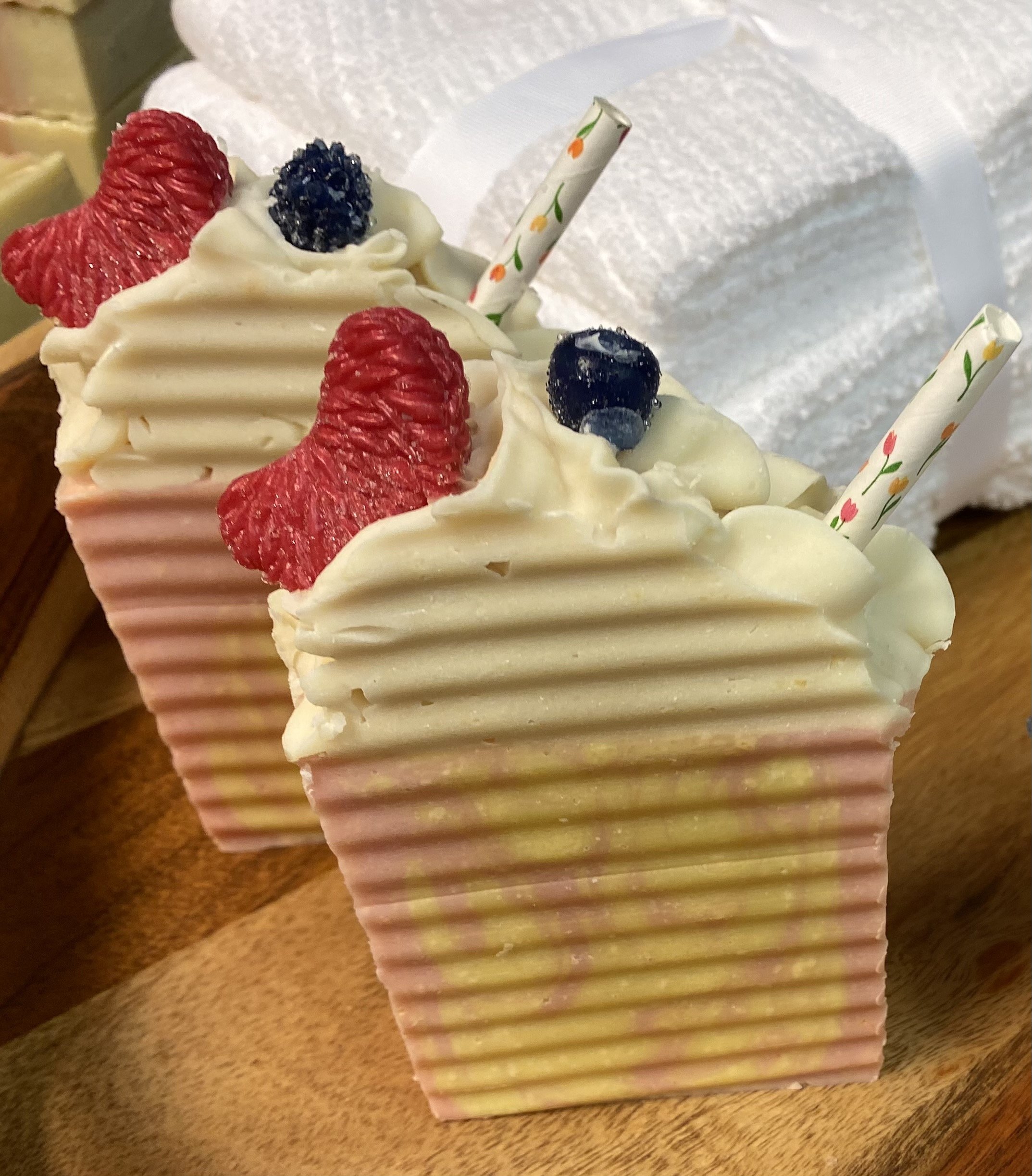 Goats Milk Raspberry Lemonade soap bar with vibrant colors and luxurious bubbles, perfect for sensitive skin.