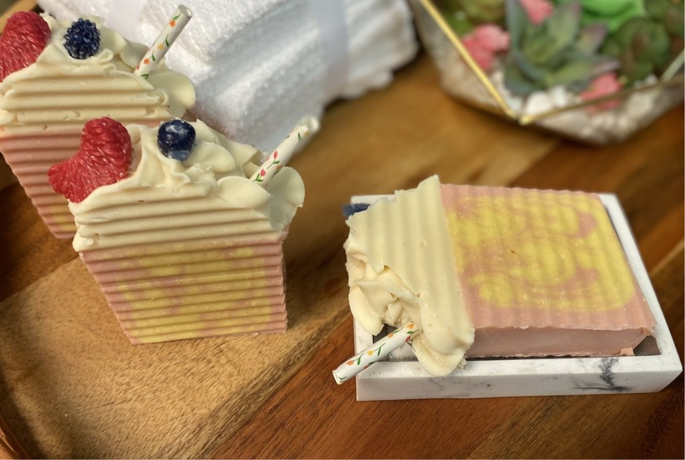 Goats Milk Raspberry Lemonade soap bar with vibrant colors and luxurious bubbles, perfect for sensitive skin.