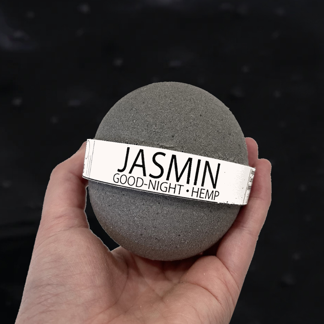 Goodnight Jasmine and Hemp Oil Bath Bomb, 8oz, featuring a vibrant color and a textured surface, ideal for a relaxing bath experience.