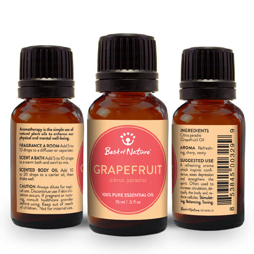 Bottle of 100% pure grapefruit essential oil with fresh grapefruit slices in the background.