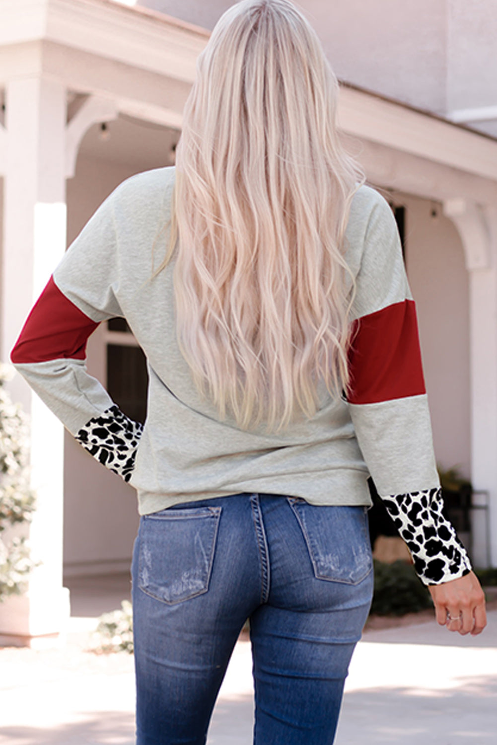 Gray sweatshirt featuring a leopard cowl neck design, drop shoulder, and splicing sleeves with animal print cuffs, perfect for casual wear.