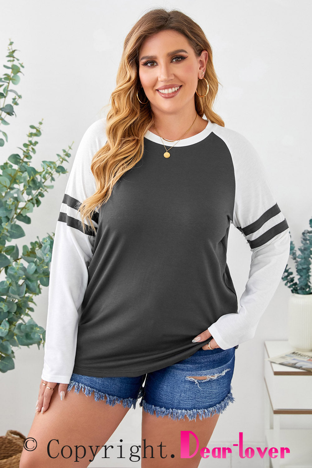 Gray crewneck top featuring striped splicing sleeves, designed for plus size women, showcasing a stylish patchwork design.