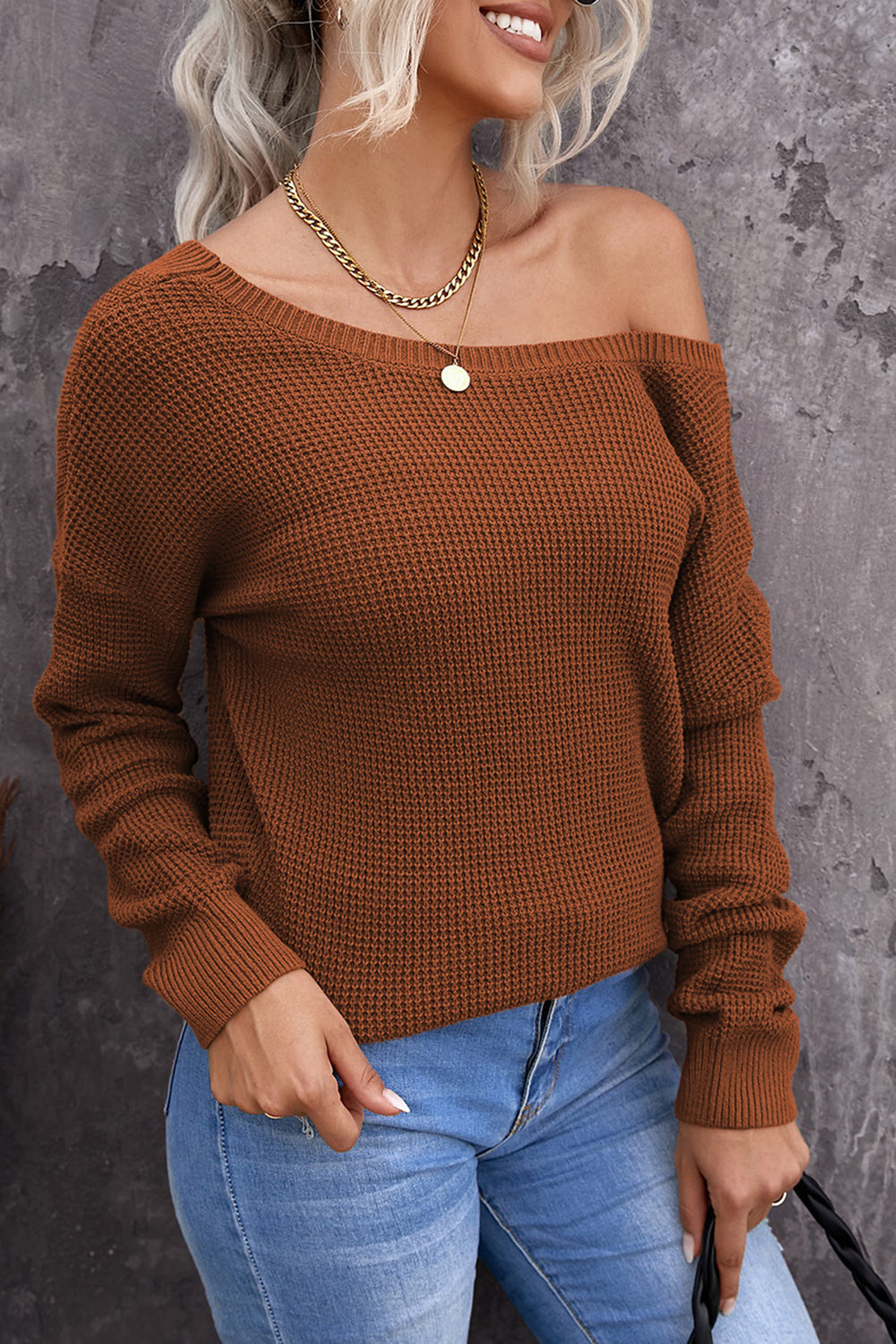 Gray Cross Back Hollow-out Sweater featuring a deep V hollow-out design and crisscross back, perfect for stylish layering.