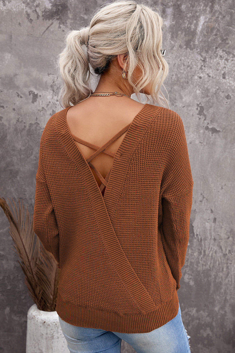 Gray Cross Back Hollow-out Sweater featuring a deep V hollow-out design and crisscross back, perfect for stylish layering.