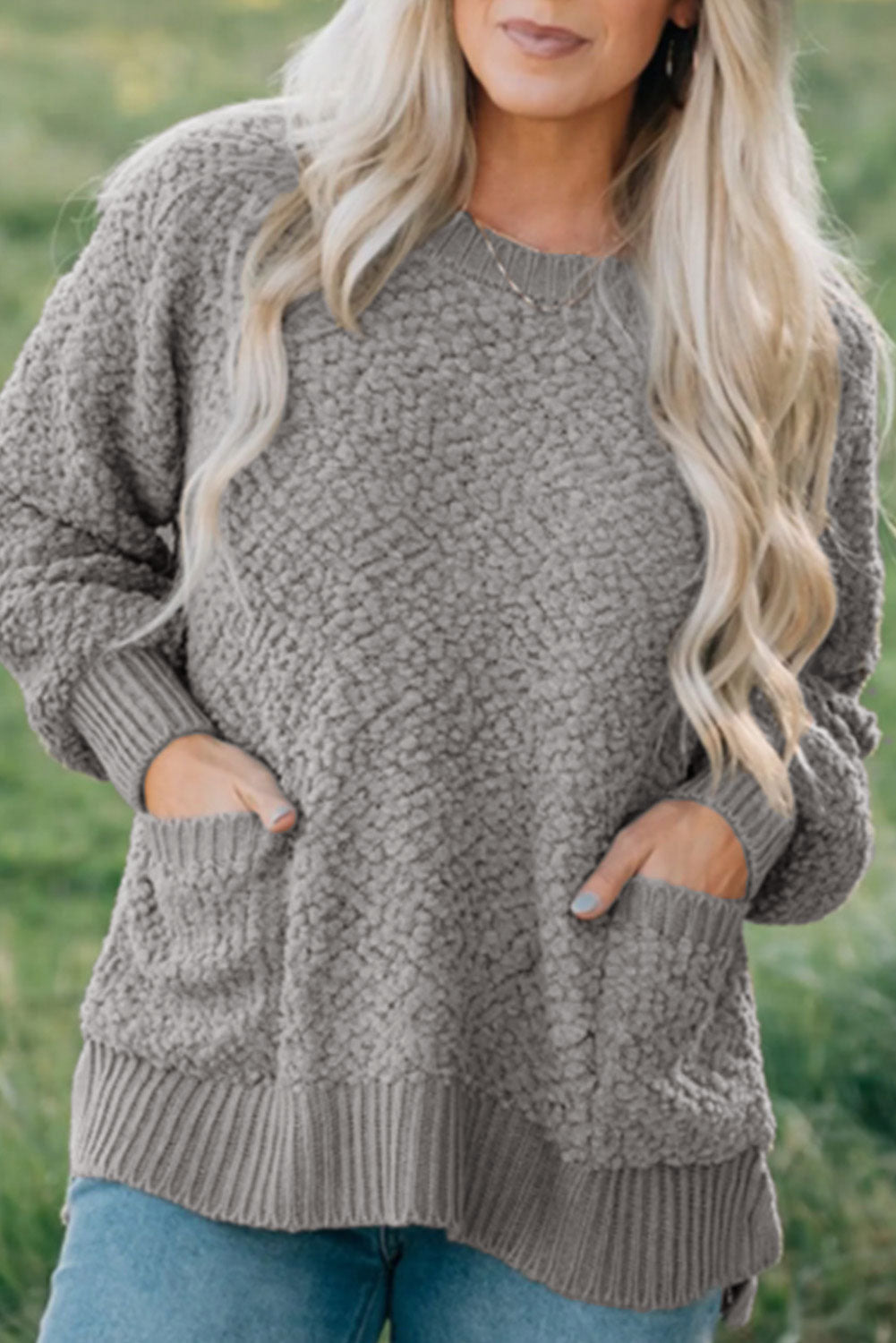 Gray Double Pockets Ribbed Trim Popcorn Knit Sweater with stylish design and soft texture, featuring double pockets and round neckline.