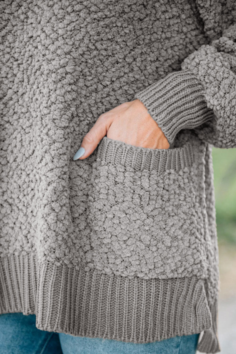 Gray Double Pockets Ribbed Trim Popcorn Knit Sweater with stylish design and soft texture, featuring double pockets and round neckline.