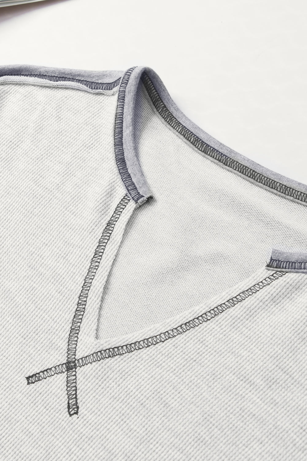 Gray Exposed Seam Ribbed Patchwork V Neck Sweatshirt showcasing unique seam details and a relaxed fit, perfect for casual wear.