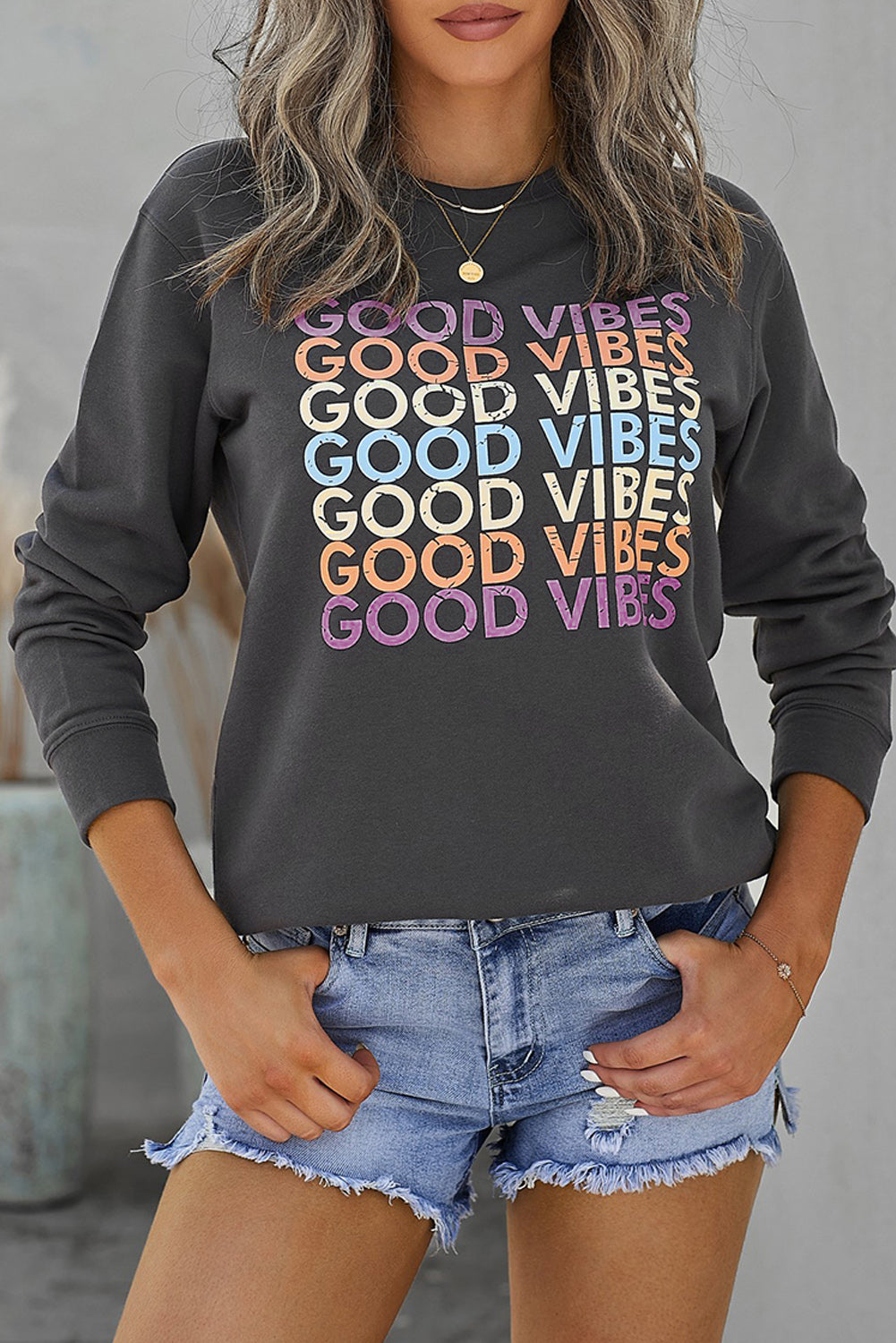 Gray GOOD VIBES Graphic Pullover Sweatshirt featuring a trendy print, soft fabric, and relaxed fit, perfect for casual wear.