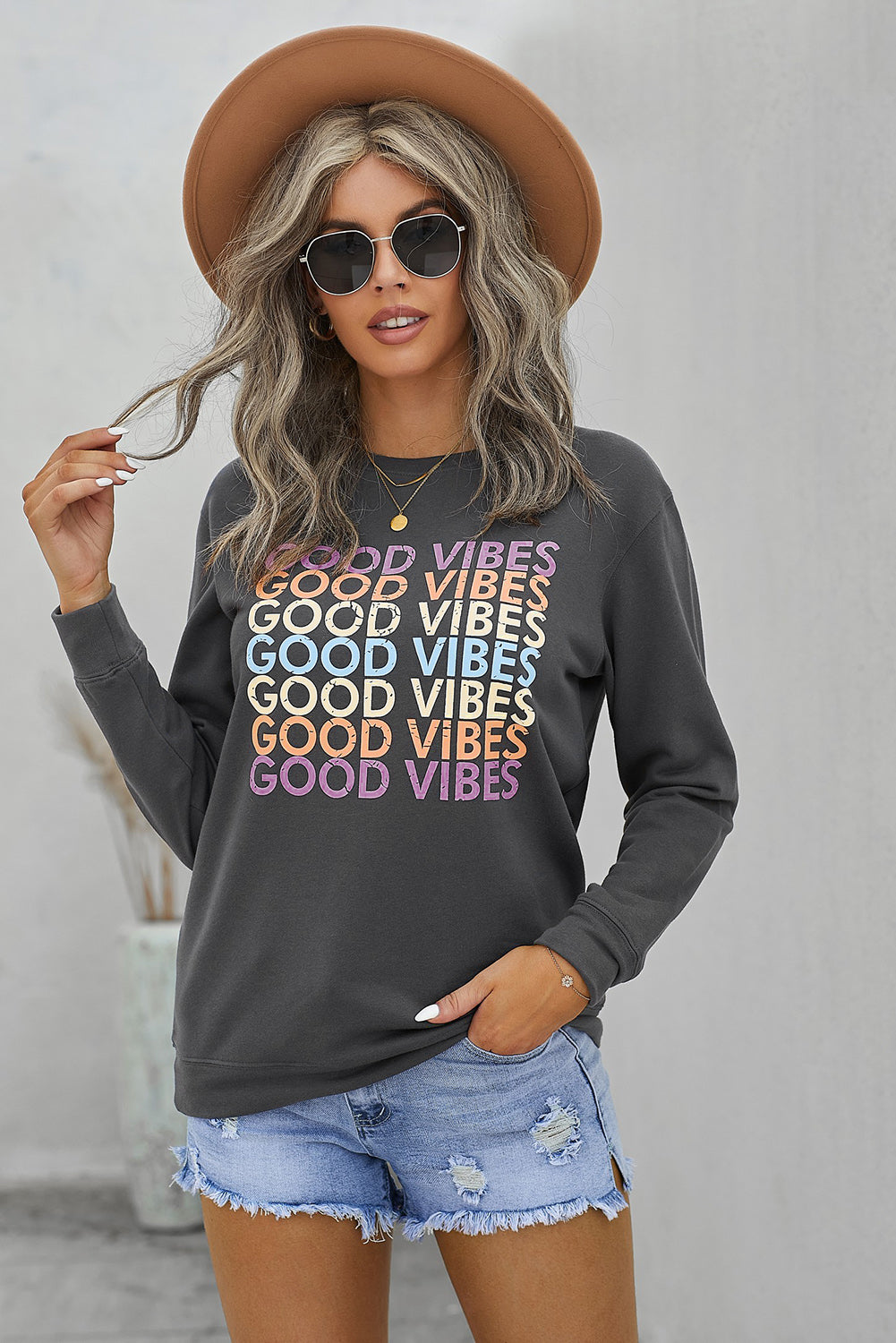 Gray GOOD VIBES Graphic Pullover Sweatshirt featuring a trendy print, soft fabric, and relaxed fit, perfect for casual wear.