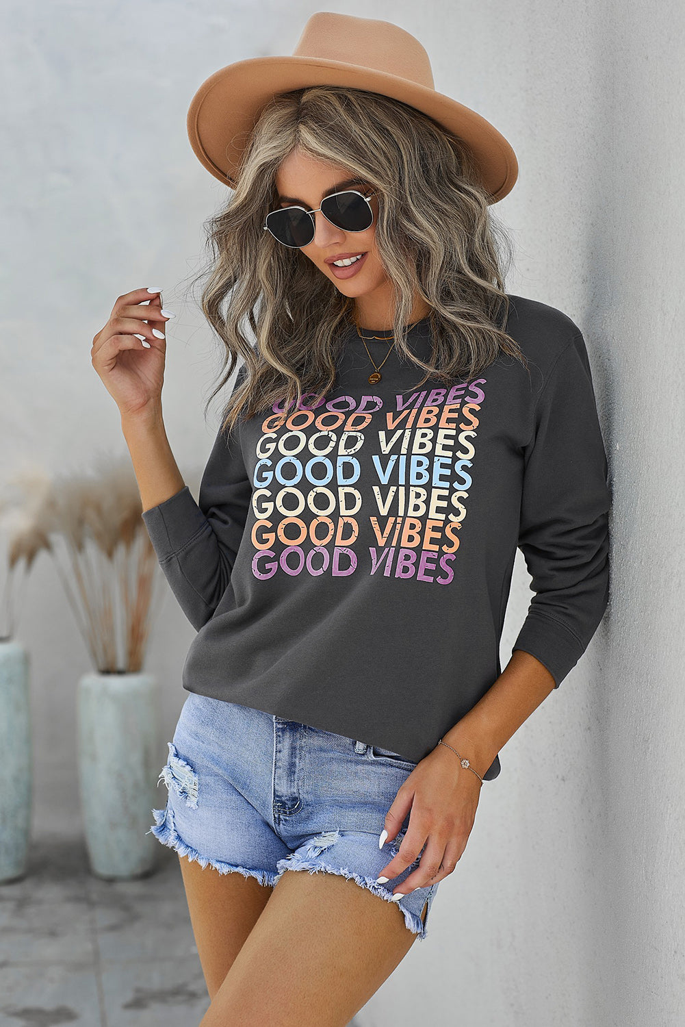 Gray GOOD VIBES Graphic Pullover Sweatshirt featuring a trendy print, soft fabric, and relaxed fit, perfect for casual wear.