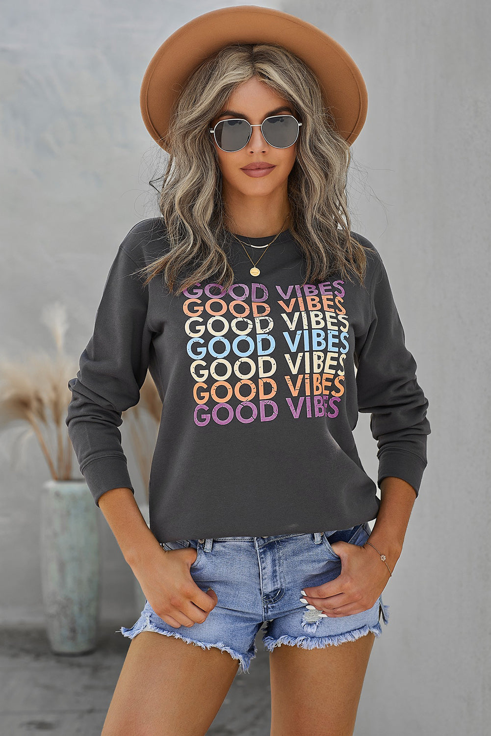 Gray GOOD VIBES Graphic Pullover Sweatshirt featuring a trendy print, soft fabric, and relaxed fit, perfect for casual wear.