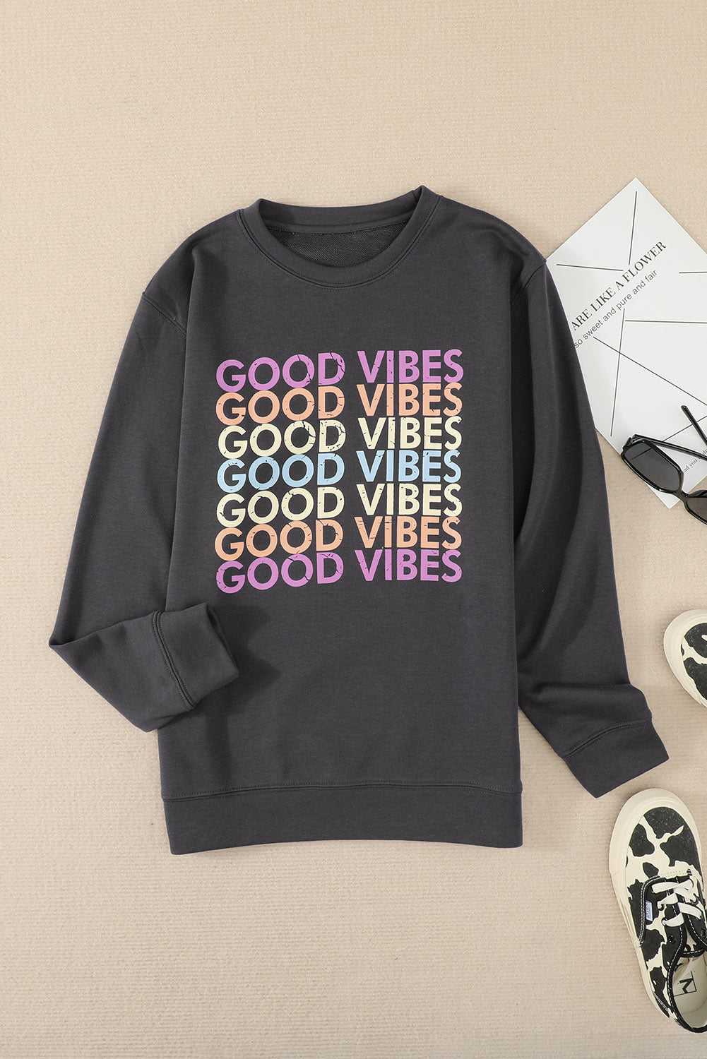 Gray GOOD VIBES Graphic Pullover Sweatshirt featuring a trendy print, soft fabric, and relaxed fit, perfect for casual wear.