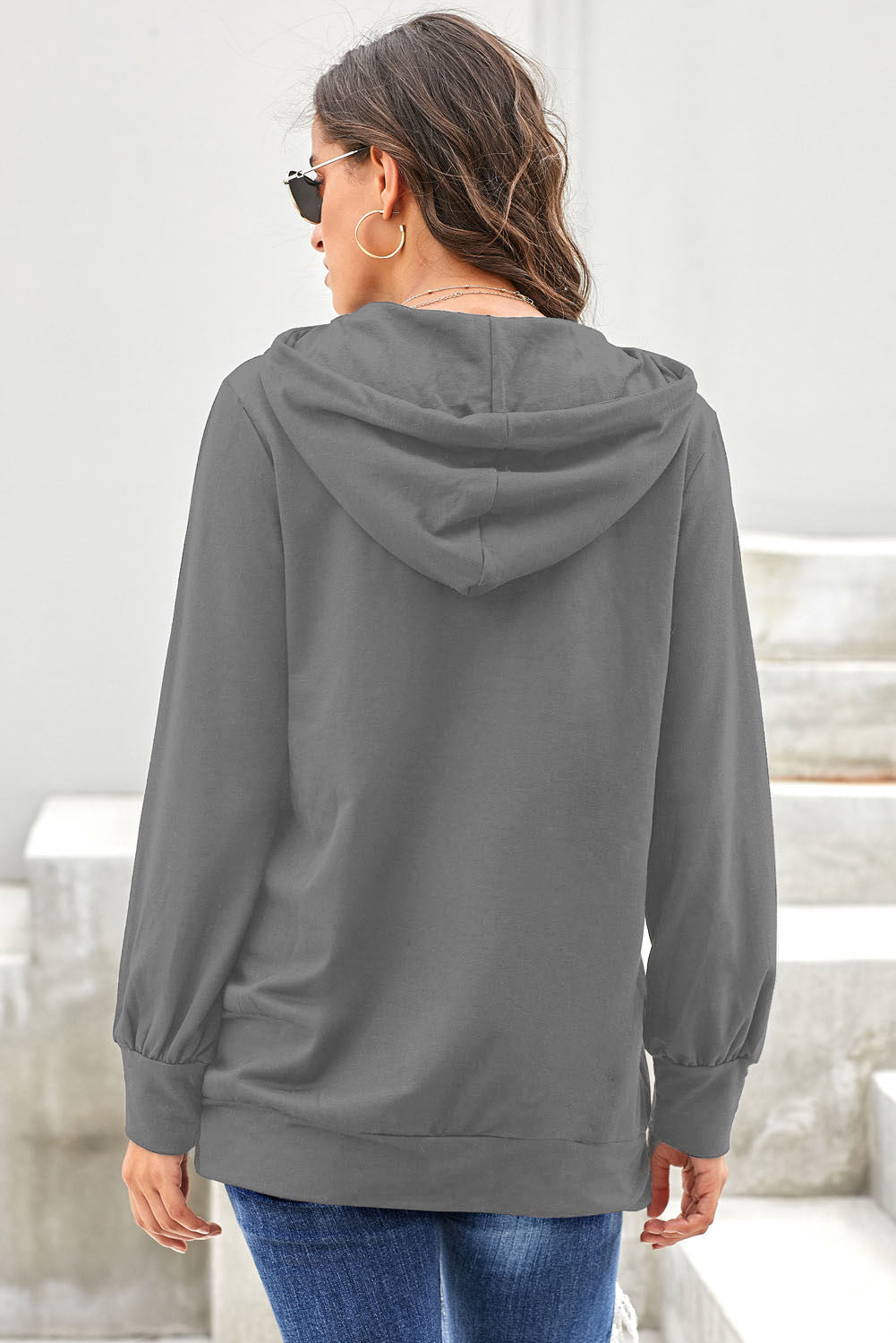 Gray long sleeve hoodie featuring a cowl neck and rope drawstring, designed for comfort and style.