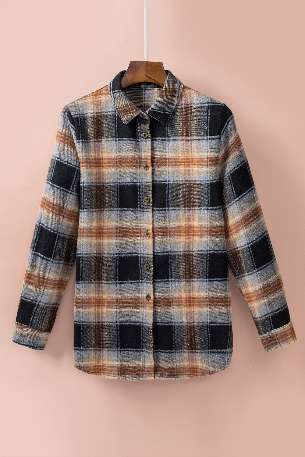 Gray oversize plaid shacket with rounded hem and slits, showcasing a stylish and comfortable design suitable for various outfits.